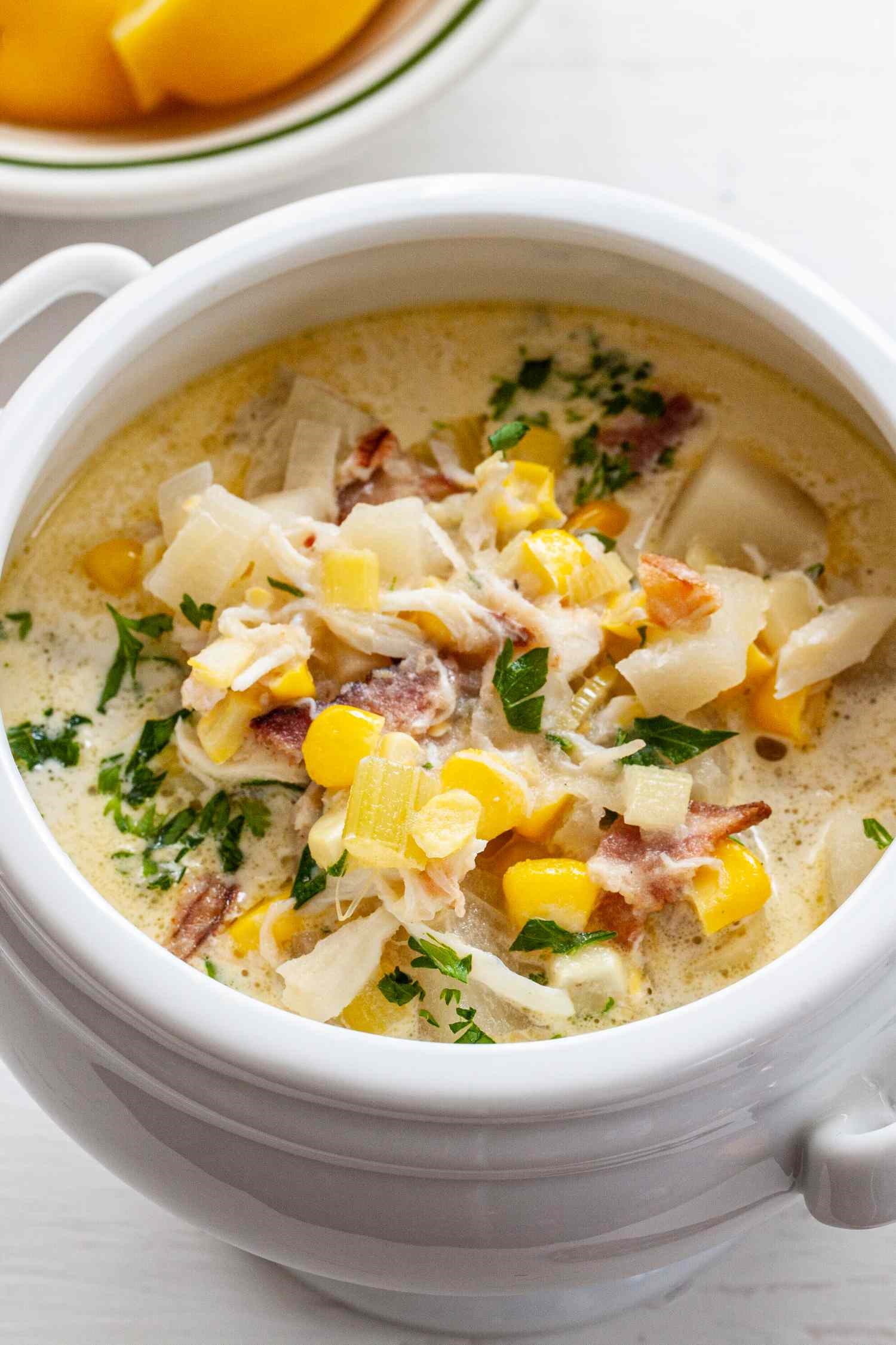 Crab and Sweetcorn Soup served in a white bowl