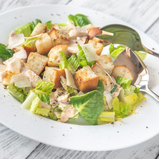 Caesar Salad served in a white bowl