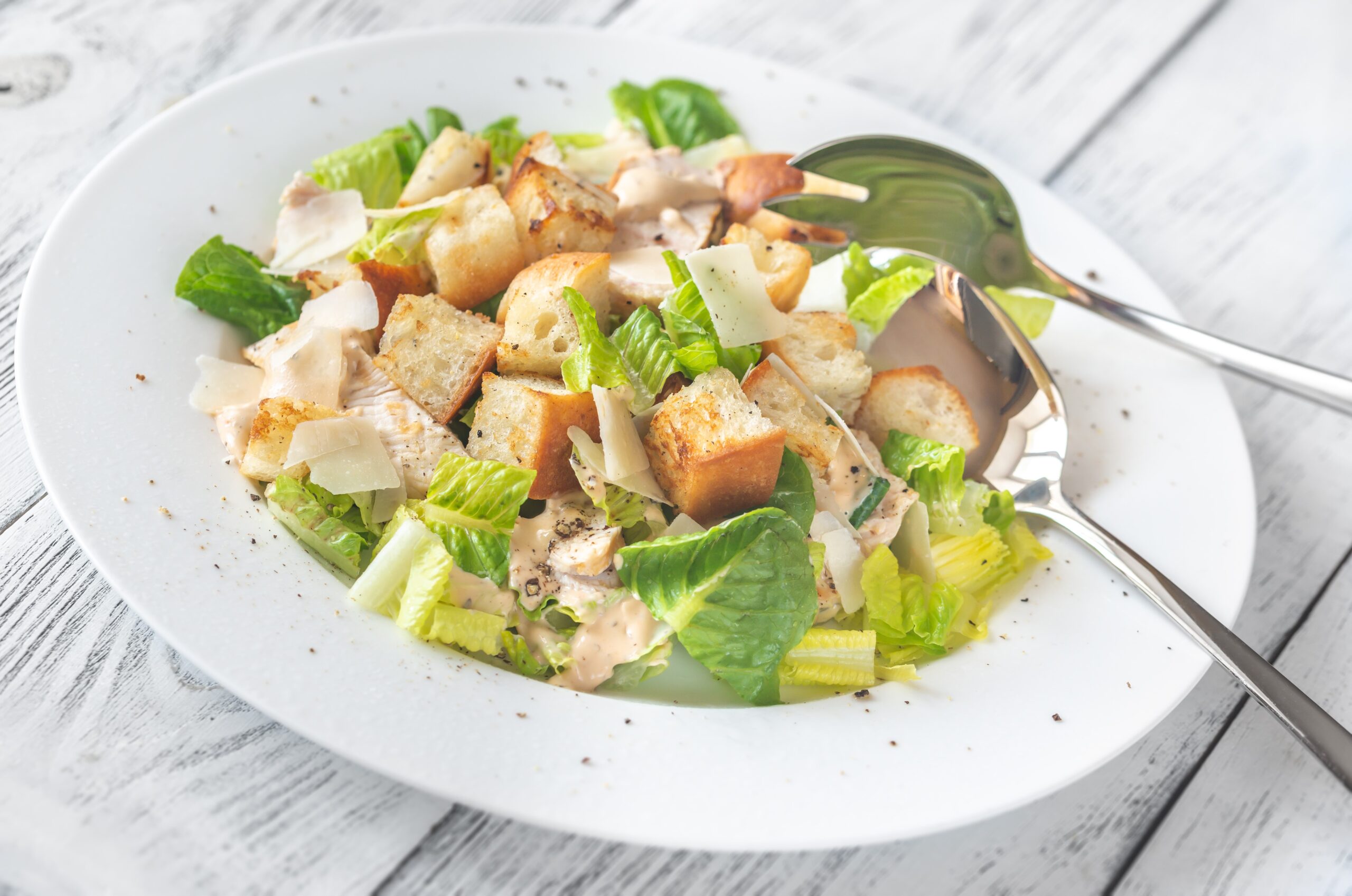 Caesar Salad served in a white bowl